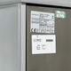 The label on the back of a refrigerator at UN climate talks showing the global warming potential and other technical information.